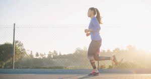 a woman running outside