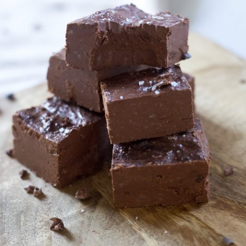 dairy-free chocolate fudge stacked on top of each other