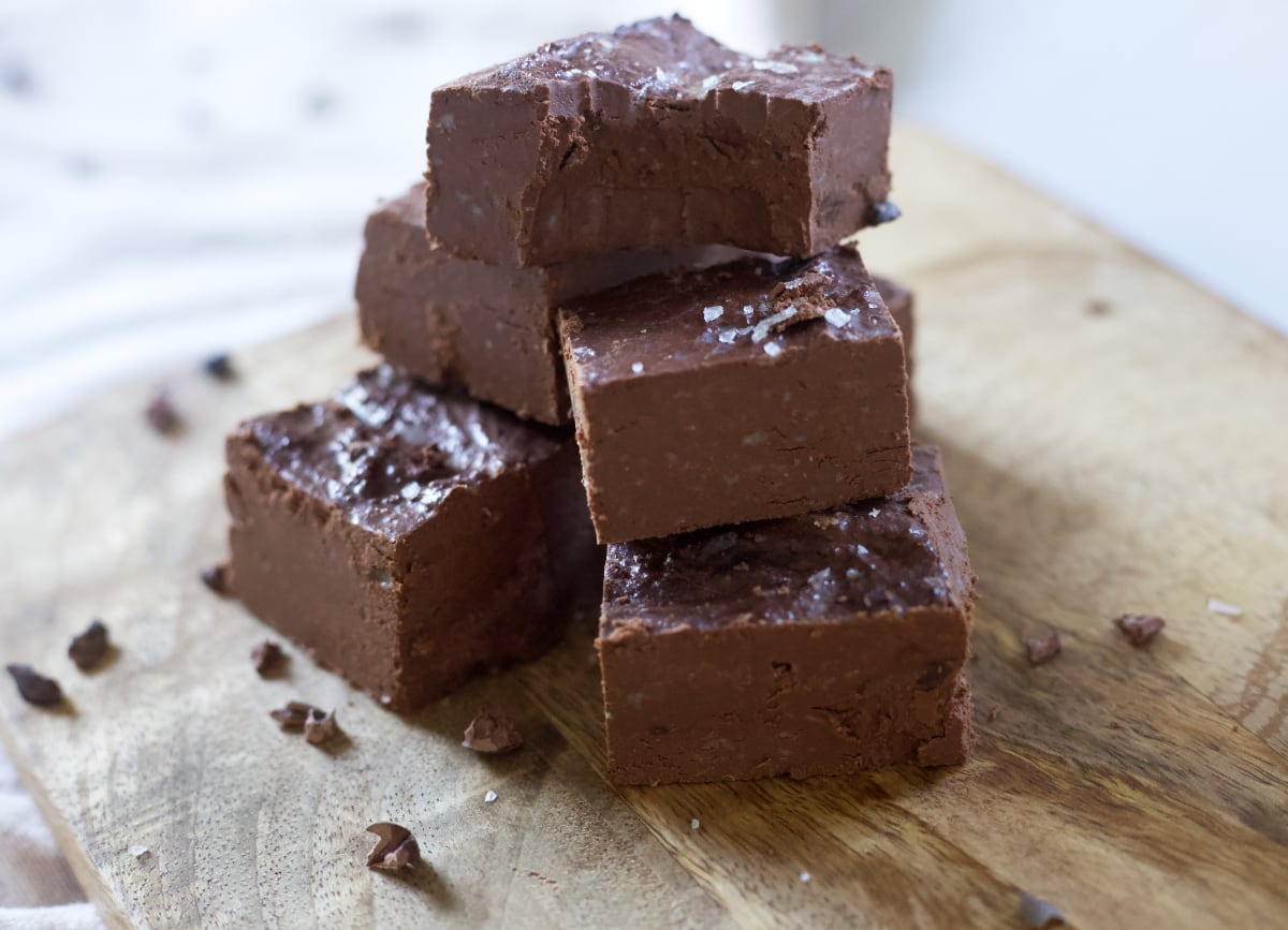 dairy-free chocolate fudge stacked on top of each other