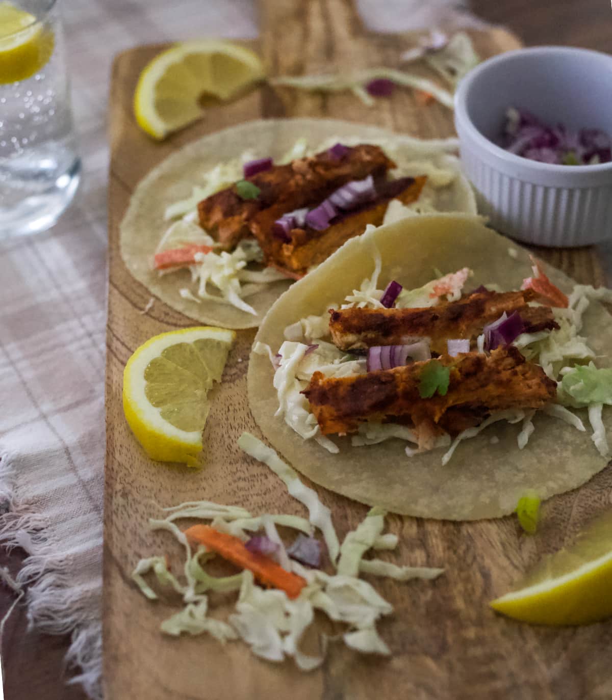 seasoned salmon served on bed of crispy cabbage slaw