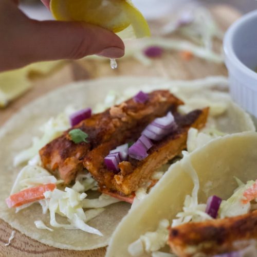 salmon tacos with crispy slaw and seasoned salmon