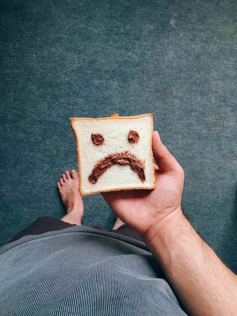 sad face on bread